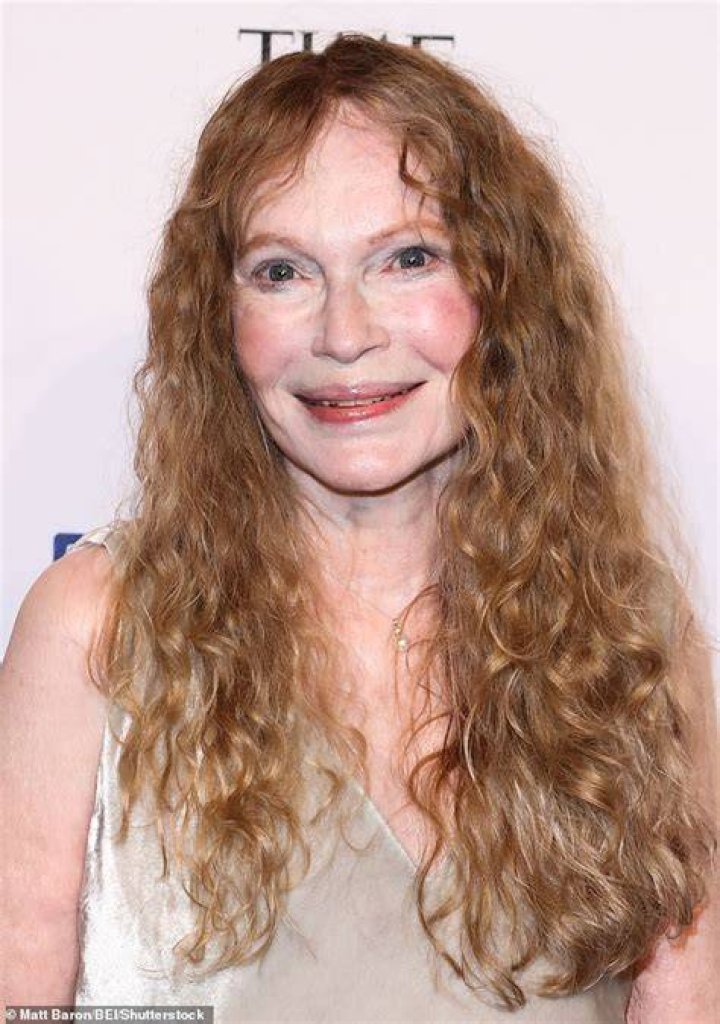 Mia Farrow, 78, looks lovely in offwhite velvet dress out as she steps