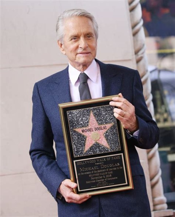 Michael Douglas gets emotional as dad Kirk supports him at Walk of Fame