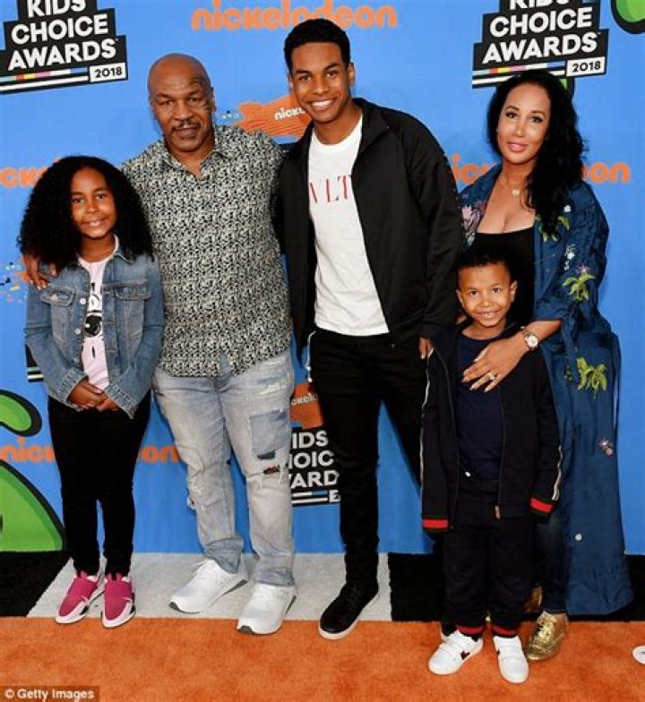 Mike Tyson dotes over his daughter Milan at the Kids' Choice Awards