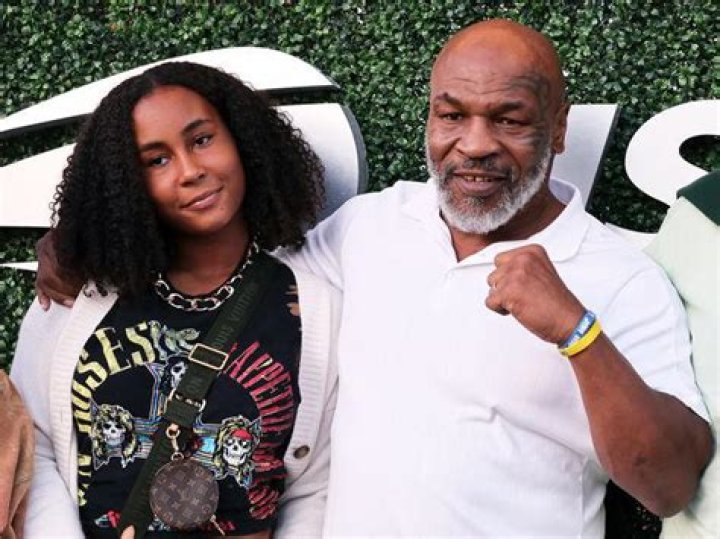 Mike Tyson (R) and daughter Mikey Tyson arrive at the Los Angeles