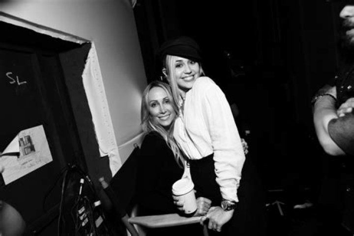 Miley Cyrus serves as maid of honor in mom Tish's wedding to actor