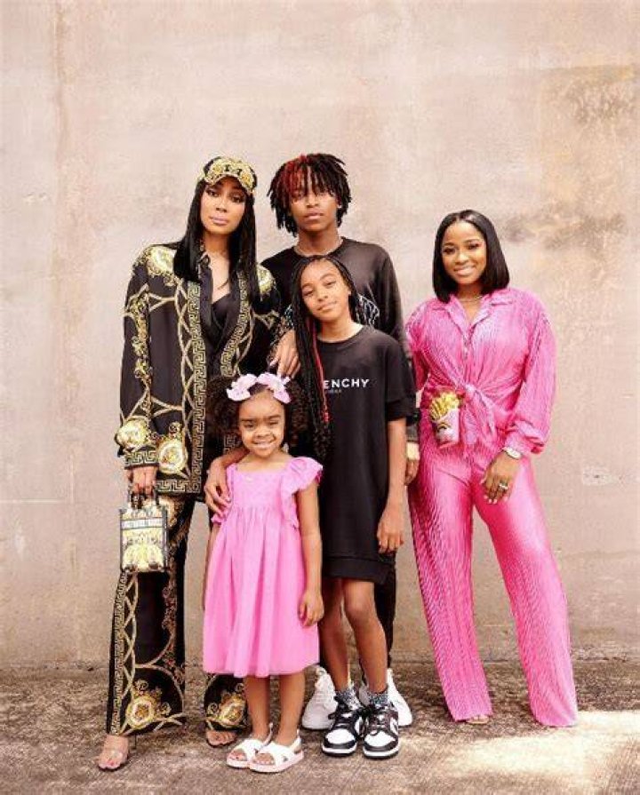 MONICA, TOYA JOHNSON, AND KIDS SUPPORT ROMELO HILL AT BASKETBALL GAME