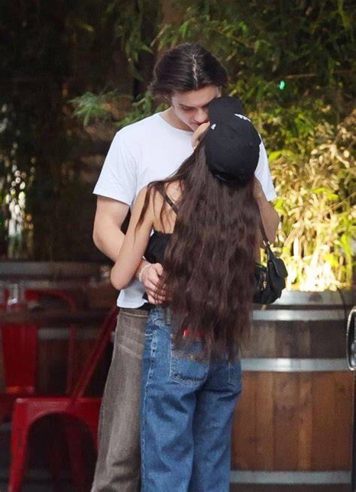 Olivia Rodrigo, 18, kisses and cuddles her producer boyfriend Adam Faze