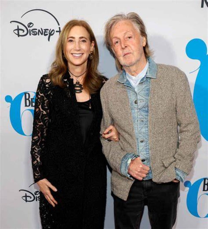 Paul McCartney and wife Nancy Shevell look so in love as they cuddle up