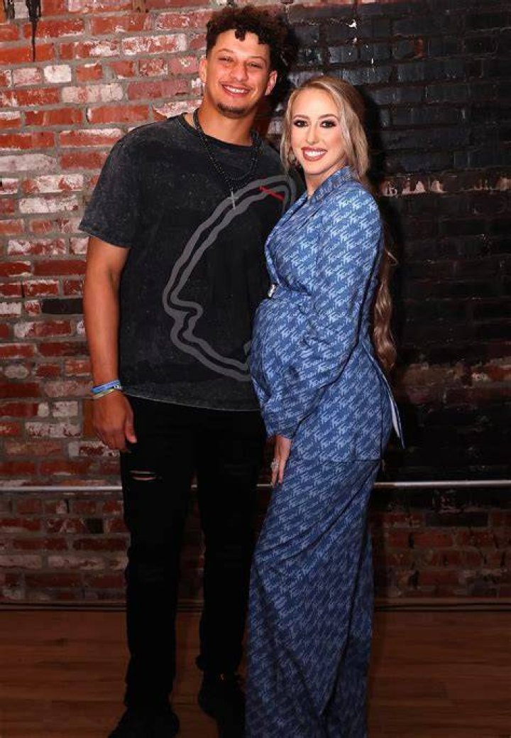 Pregnant Brittany Mahomes Poses in Blue Suit with Patrick Mahomes