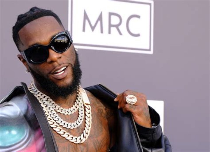 Rare photos of Burna Boy and his father Samuel Ogulu