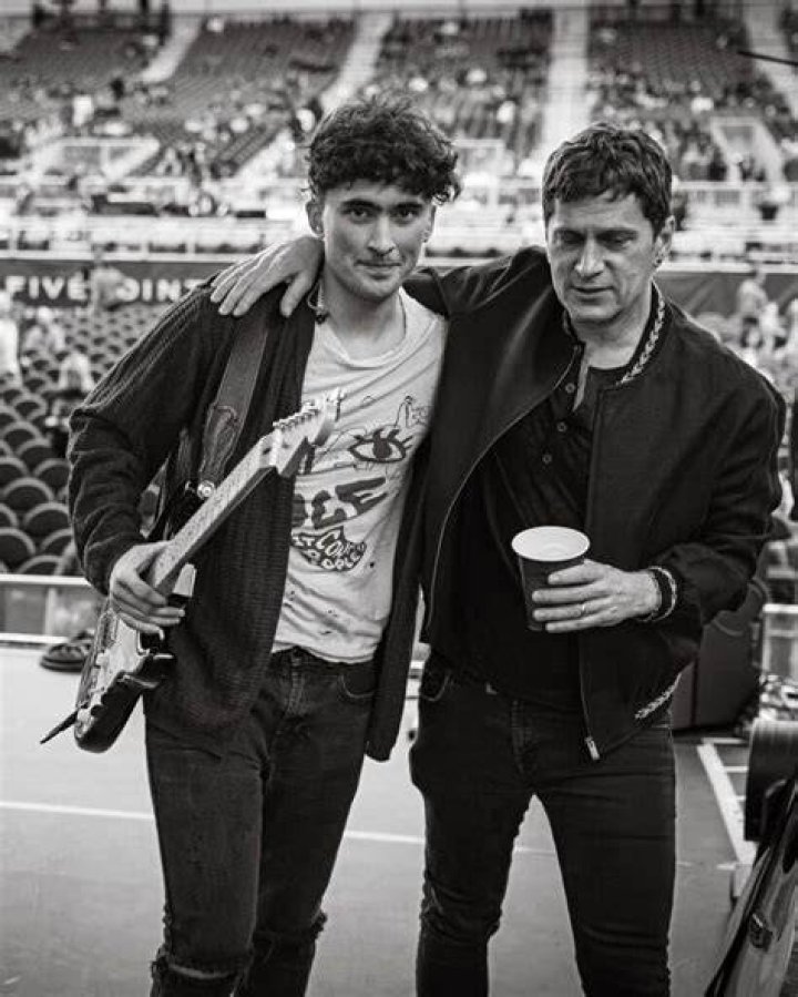 Rob Thomas and his son, Maison. I don't think they look alike. Rob