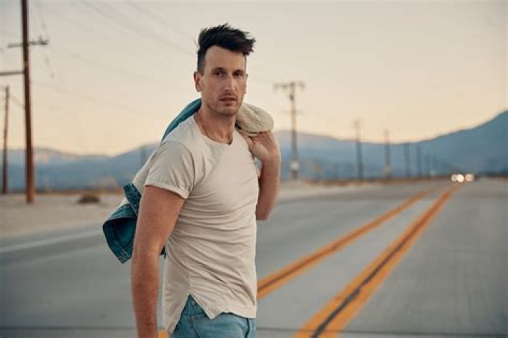 Russell Dickerson Ties Record With 21 Weeks In The Top 10