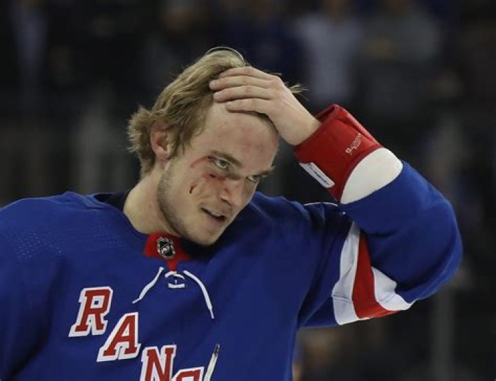 Ryan Lindgren will not return following late hit by David Pastrnak