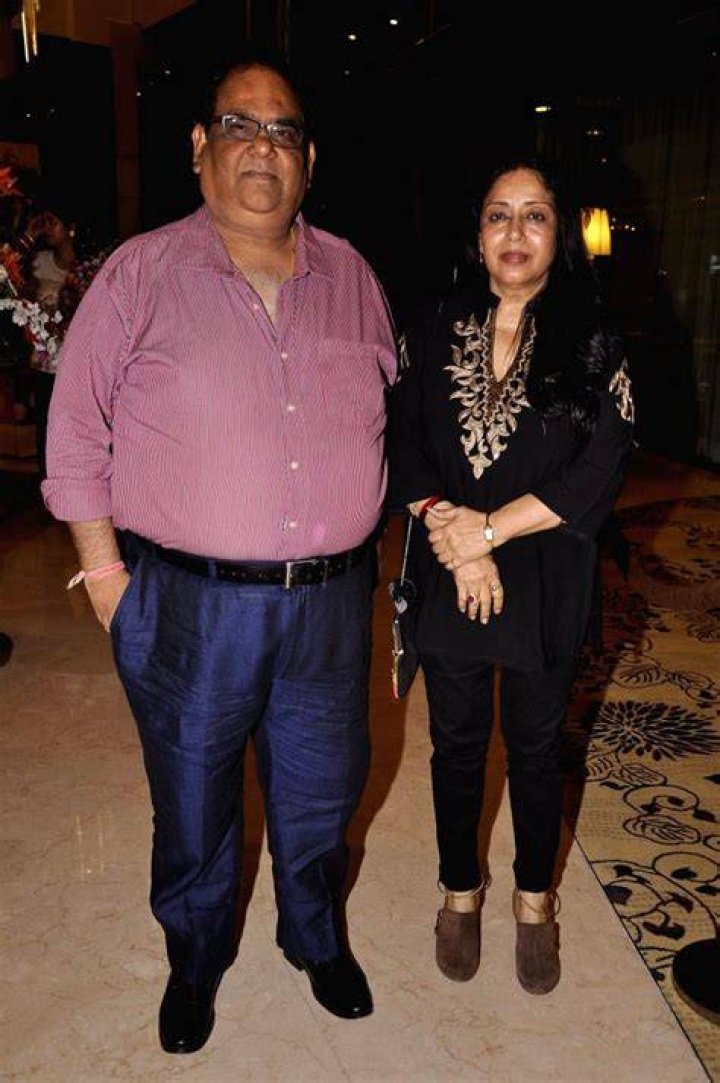 Satish Kaushik with his wife at Karwa Chauth 2014 celebrations in