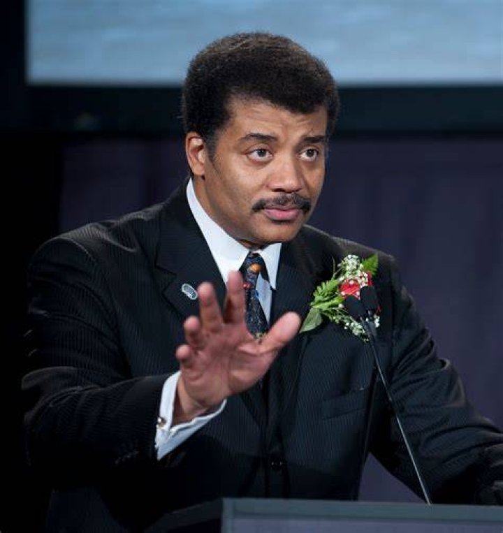 See Neil deGrasse Tyson TrashTalking Pluto! Parade