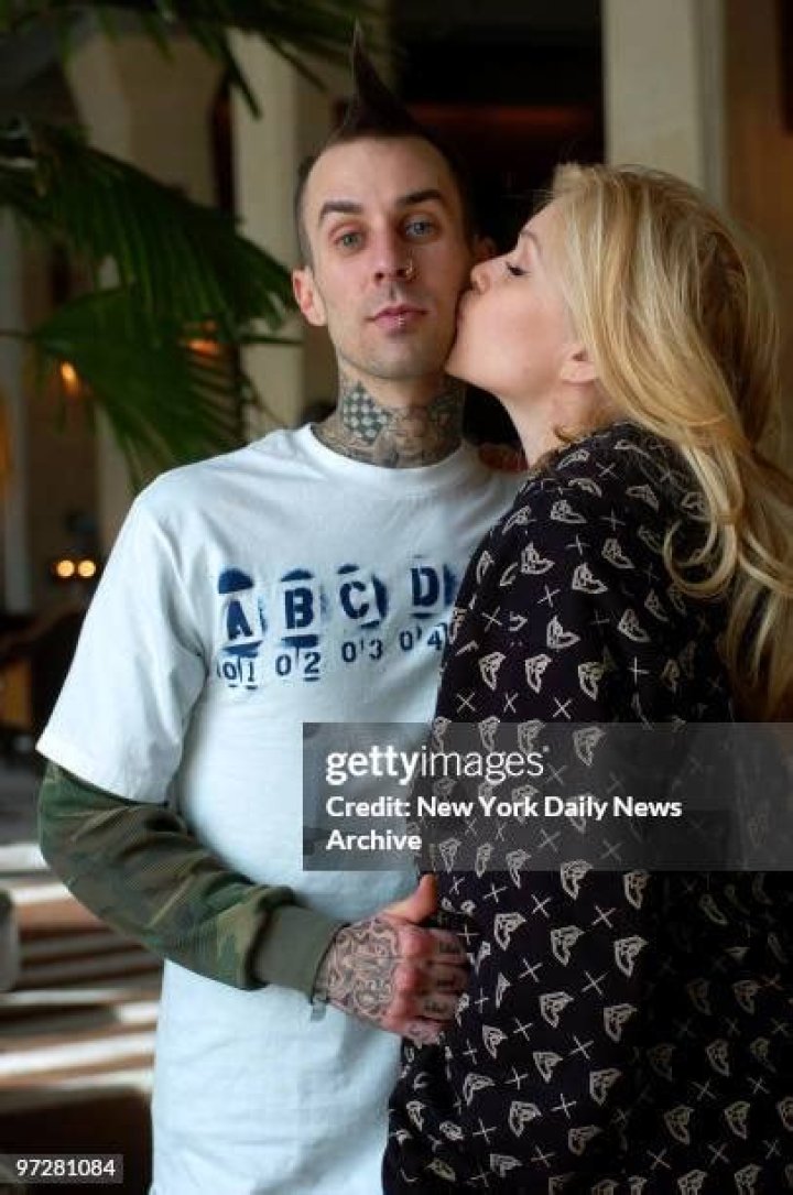 Shanna Moakler Kissing her boyfriend Matthew Rondeau at LAX GotCeleb