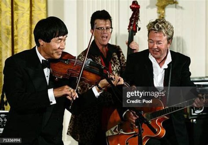 Shoji Tabuchi with Brian Setzer and D.C. Tabuchi