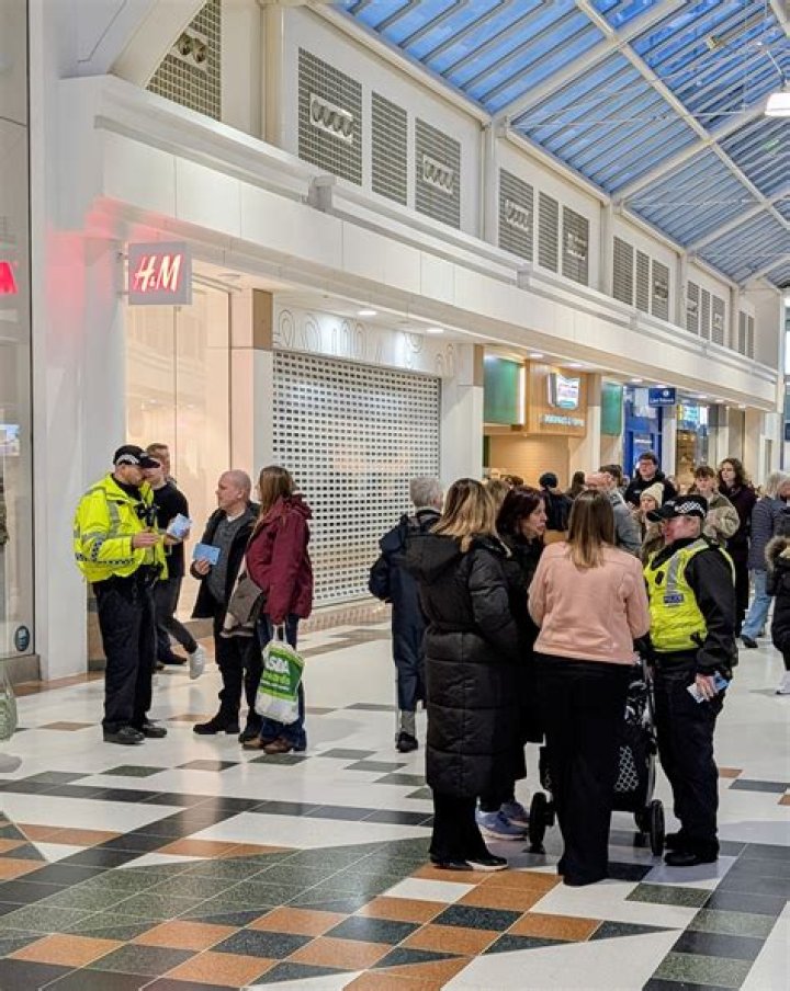 Shoppers evacuated after 'threat' call as specially trained officers search