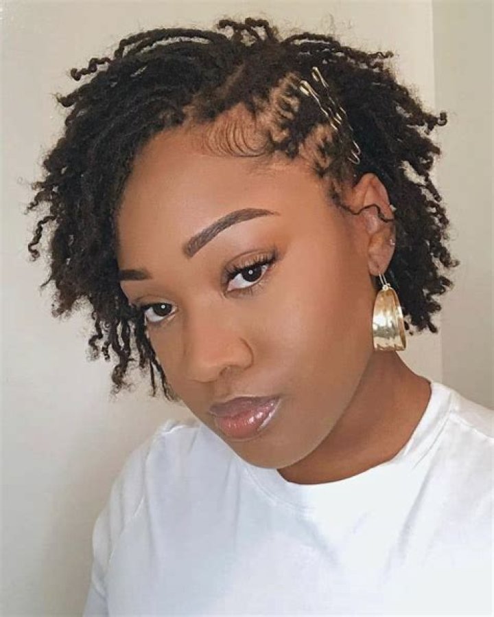Short Locs Updo ️💛💚 . . . Now booking for August & September Styleseat