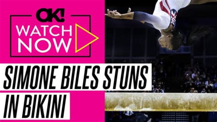 Simone Biles Shows off Her Toned Figure in Cool Snake Print Top and