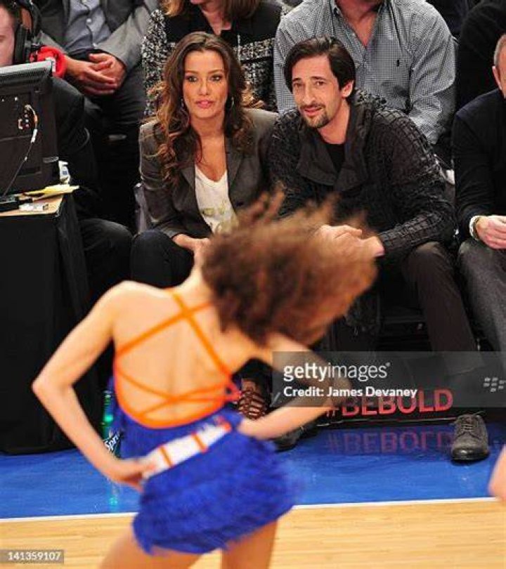 Sky Nellor and Adrien Brody attend the Portland Trail Blazers vs New