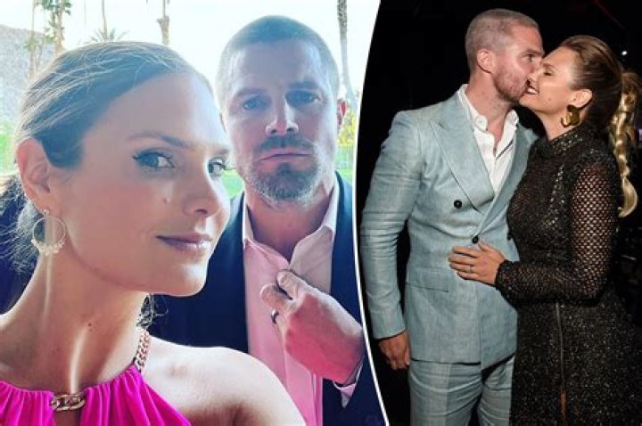Stephen Amell kisses wife on red carpet after plane incident