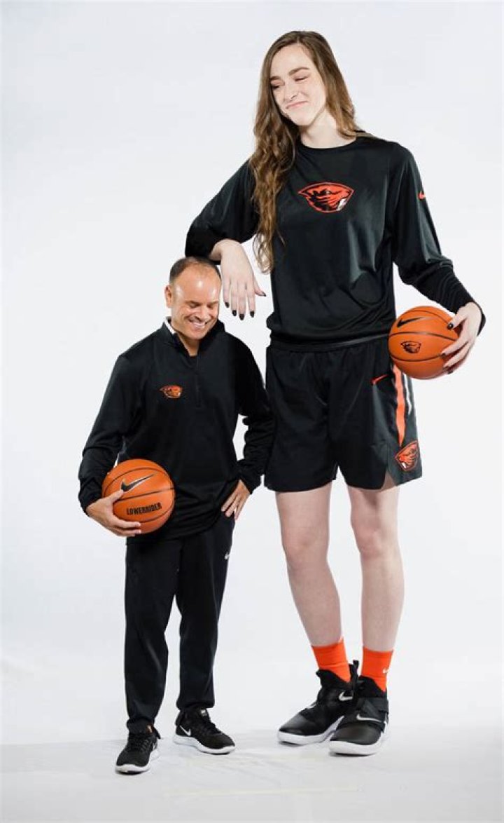 Tall Basketball player with tiny coach by lowerrider on DeviantArt