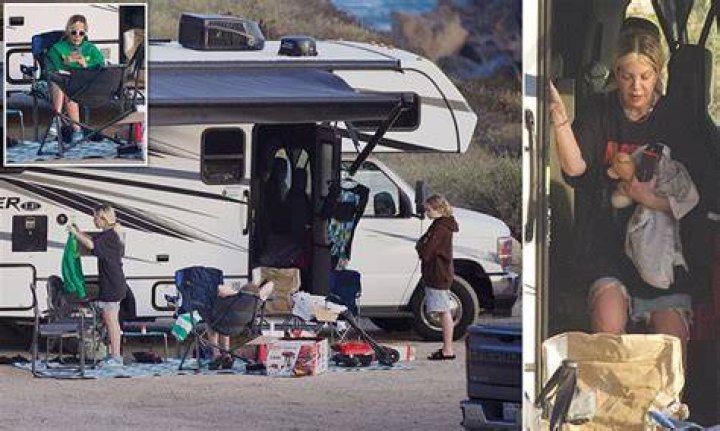 Tori Spelling was spotted strolling with Ryan Cramer Tori Spelling was spotted strolling with Ryan Cramer