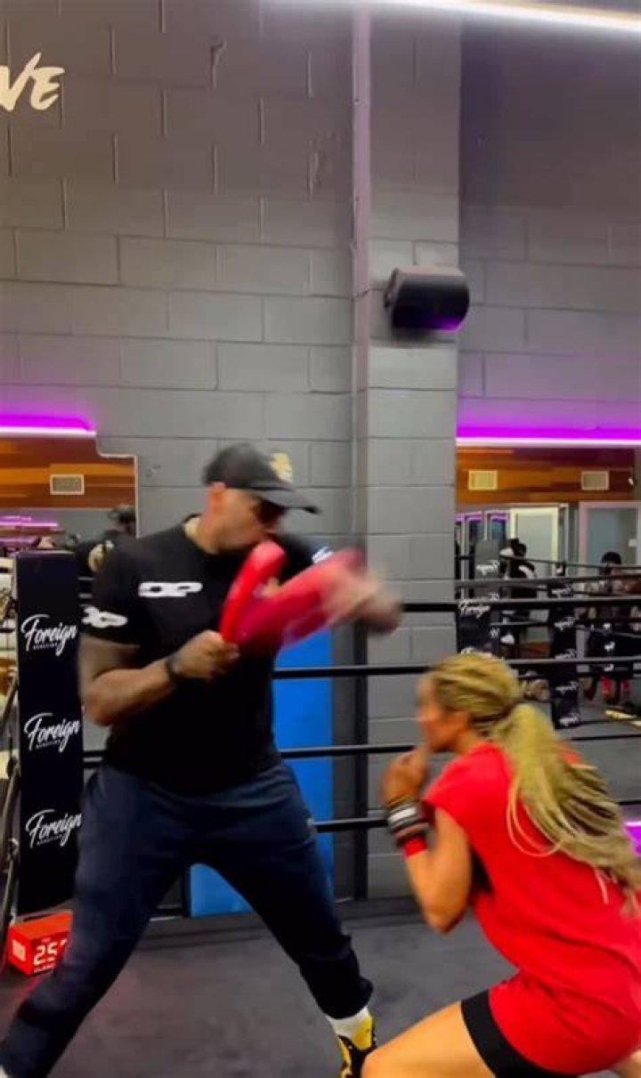 Training footage of Kate Abdo shows off fast hands with Malik Scott who