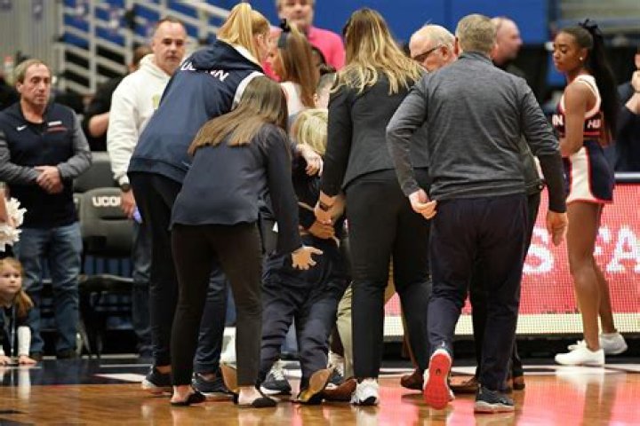 UConn associate coach stretchered off after medical emergency