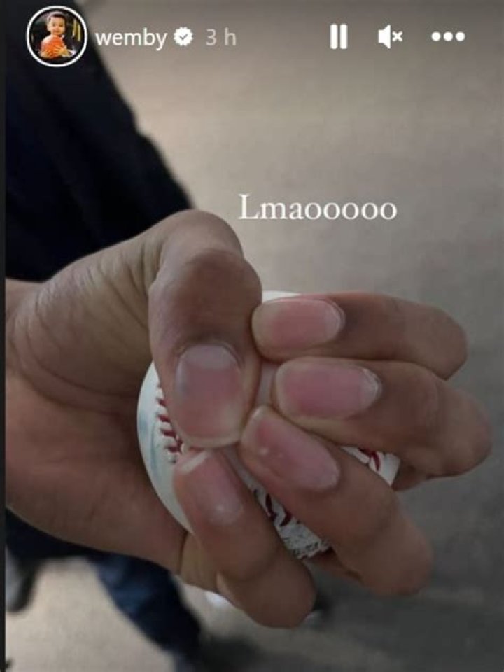 Victor Wembanyama holding a baseball in his giant hand r/baseball