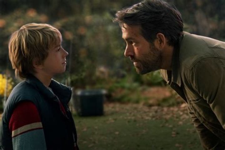 Walker Scobell as Young Adam with Adam and his on-screen dad