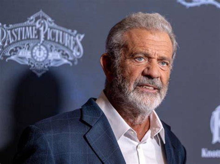 What did Mel Gibson do to gain impressive muscles at his mature age?