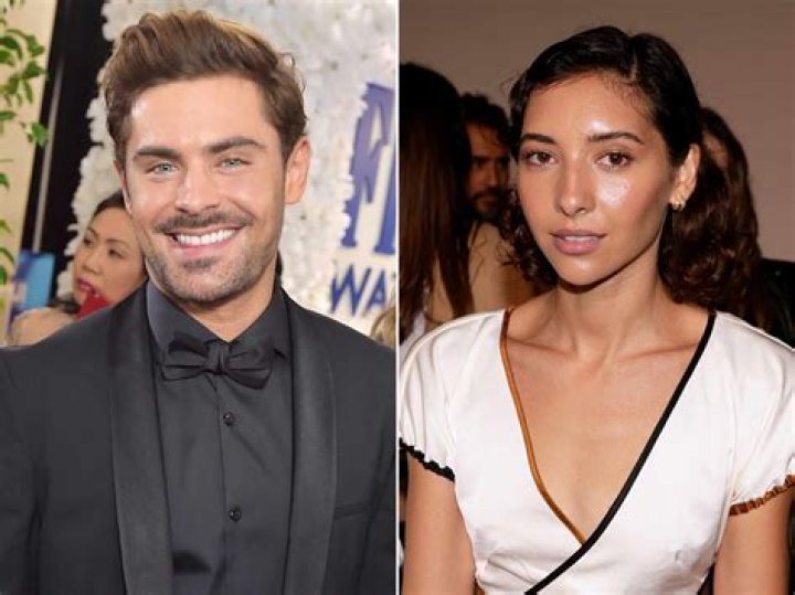 zac efron and vanessa holding hand on the beach and zac no top Zac